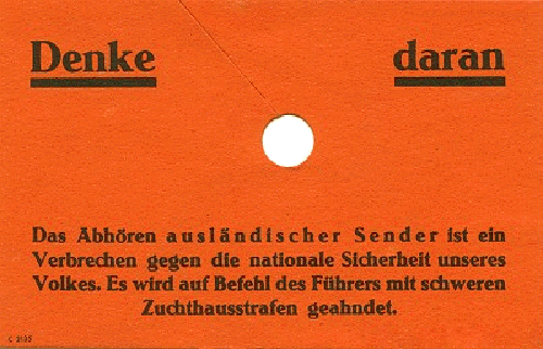 Paper label that was attached to radios ("Volksempfängern") in the Third Reich. It warns the population against listening to so-called "enemy stations". Author unknown. Wikimedia Commons